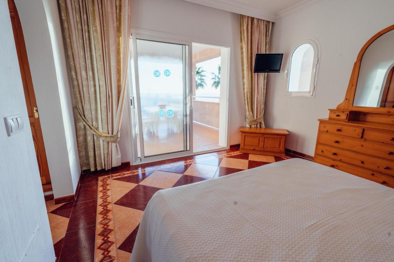 Apartamentos Punta Prima Beach Bagian luar foto